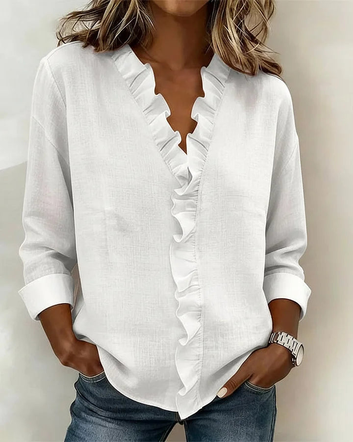 Chiara | Blusa con scollo a V e volant delicati