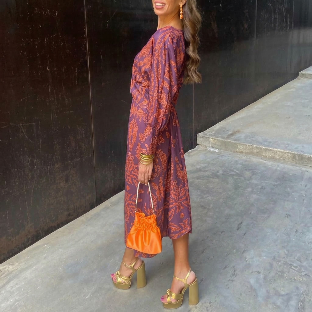 Isadora – Abito Midi Elegante con Nodo in Vita e Stampa Artistica