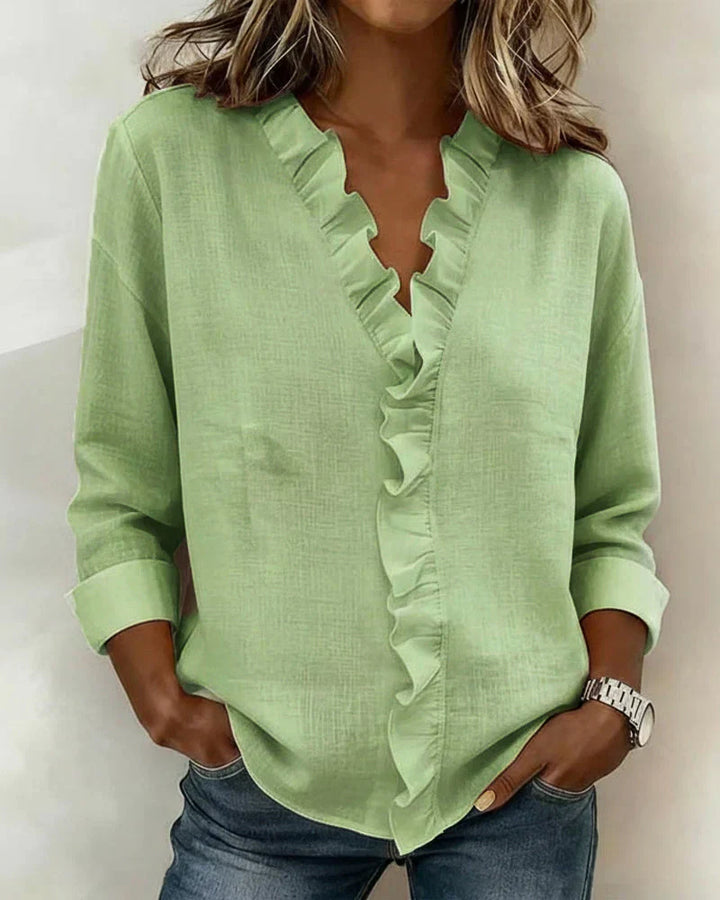 Chiara | Blusa con scollo a V e volant delicati